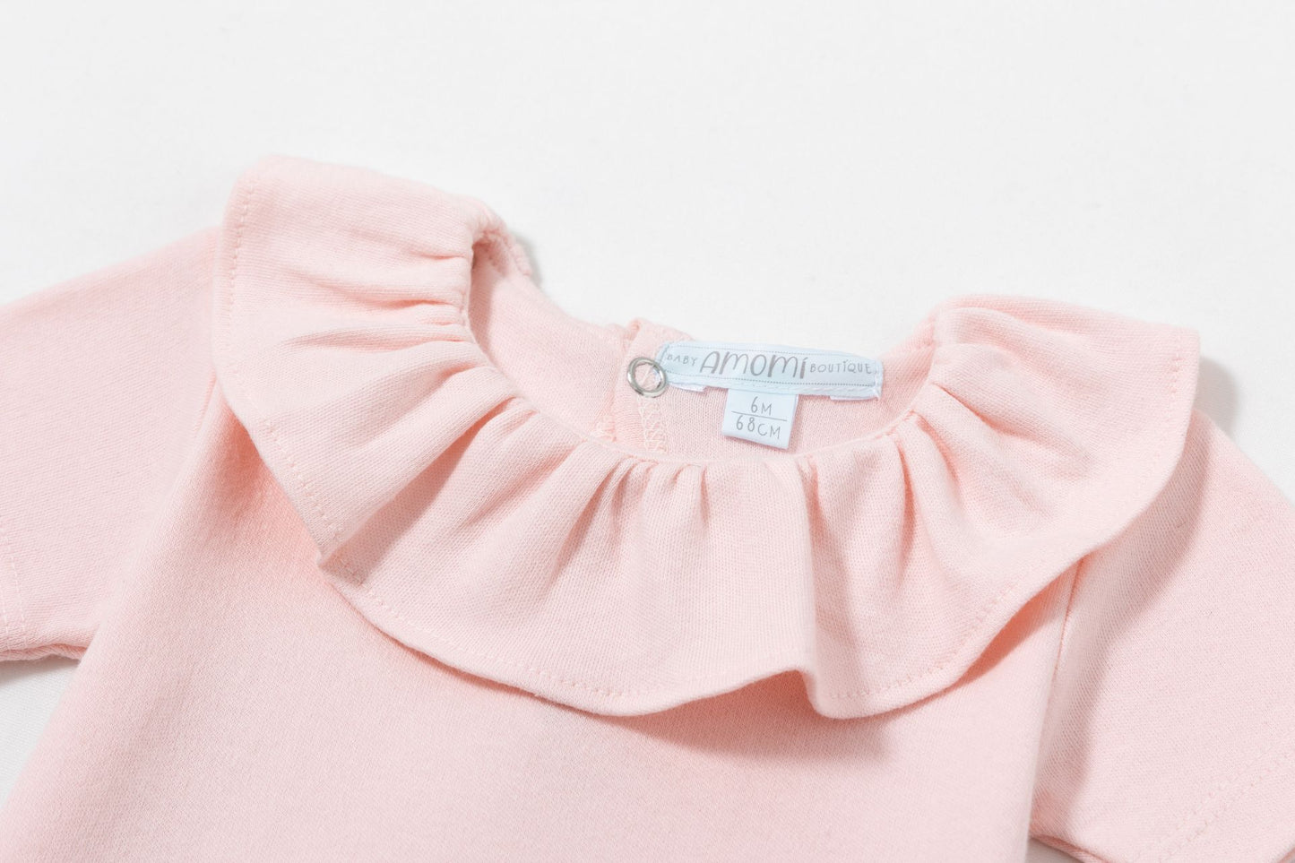 Body  cuello volante rosa bebe 1-24 meses