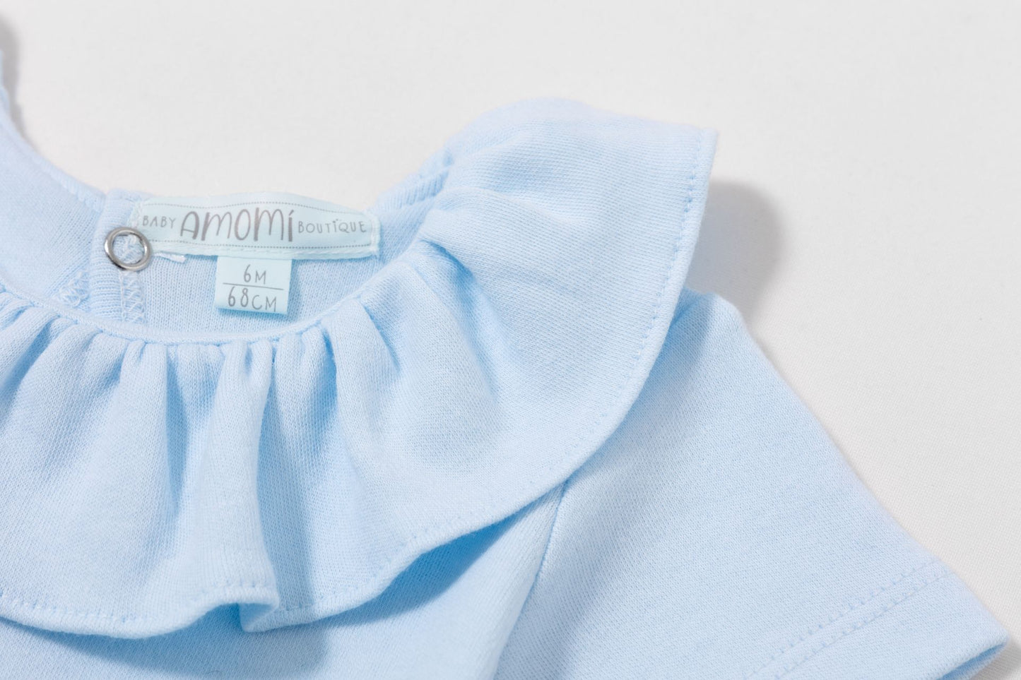 Body cuello volante celeste bebe 1-24 meses