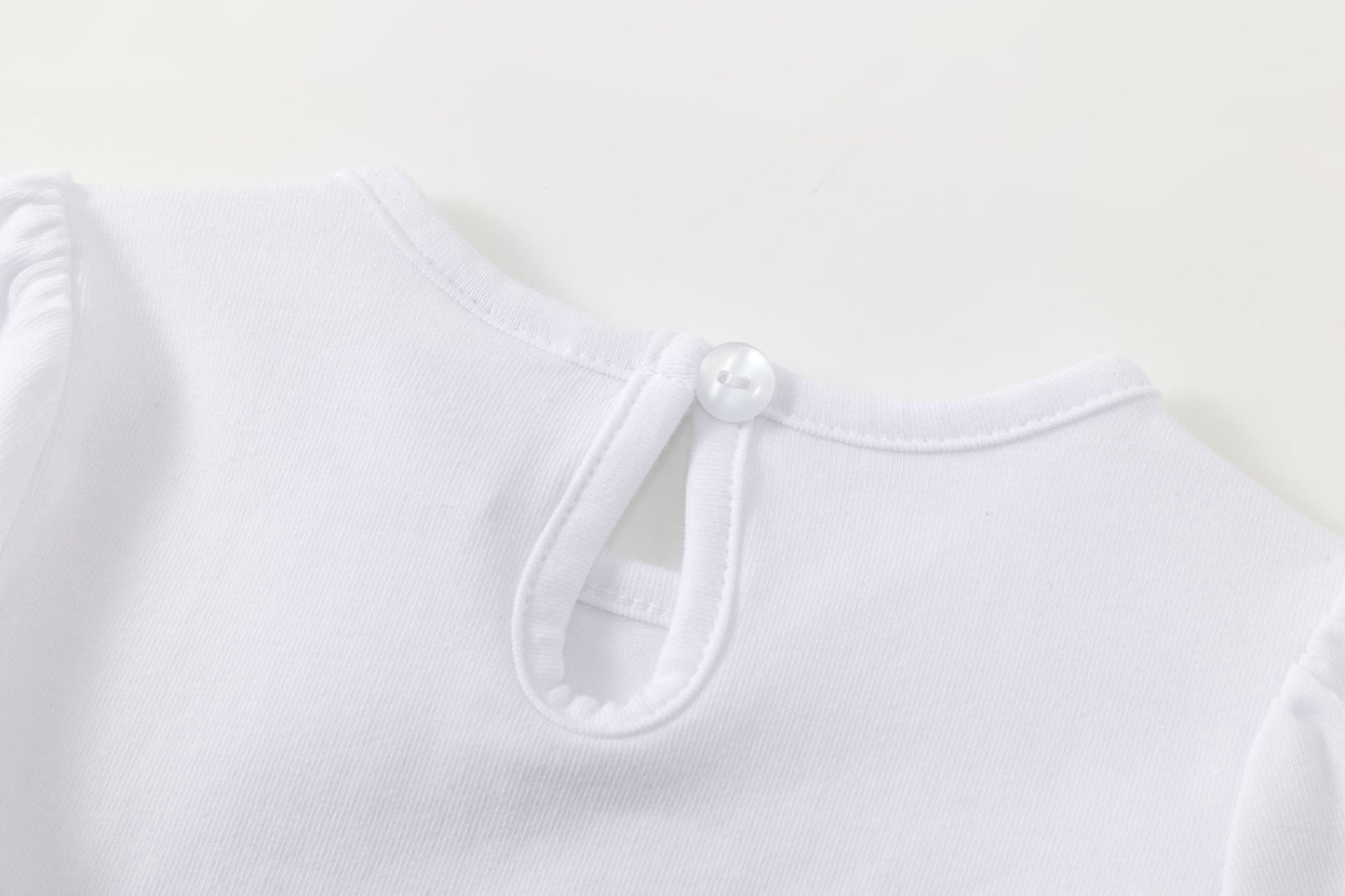 Camiseta bebé niña blanca manga larga con frunce y glitter ✨🌸 - BGI65514