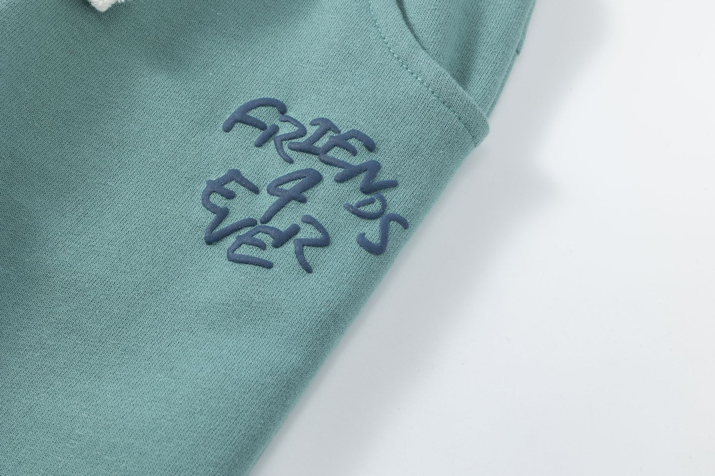Pantalón deportivo niño felpa azul turquesa con bolsillos | 2-6 años