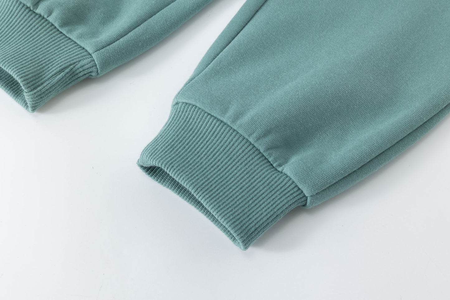 Pantalón deportivo niño felpa azul turquesa con bolsillos | 2-6 años