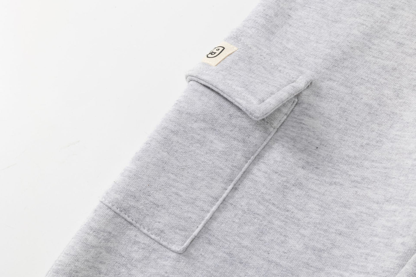 Pantalón deportivo niño felpa gris claro con cordón y bolsillos | 2-6 años