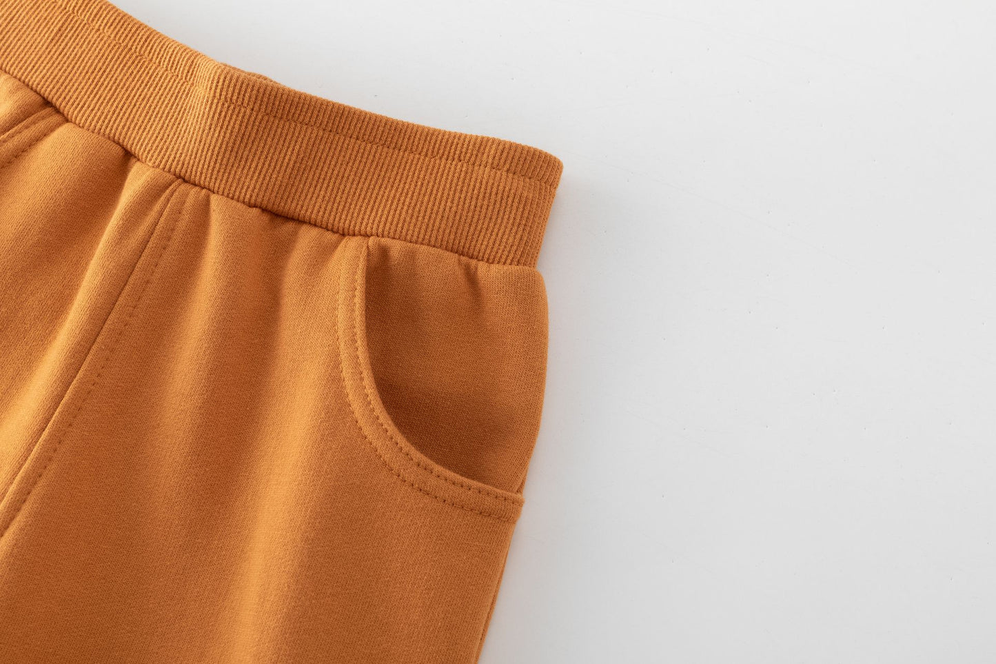 Pantalón niño felpa perchada naranja con bolsillos | 2-6 años