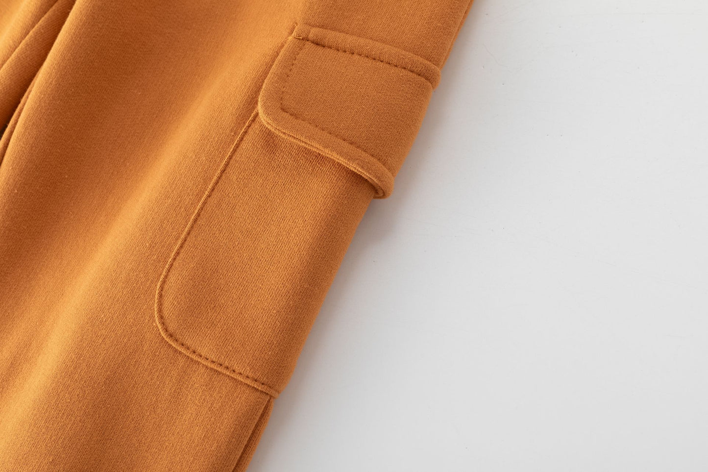 Pantalón niño felpa perchada naranja con bolsillos | 2-6 años