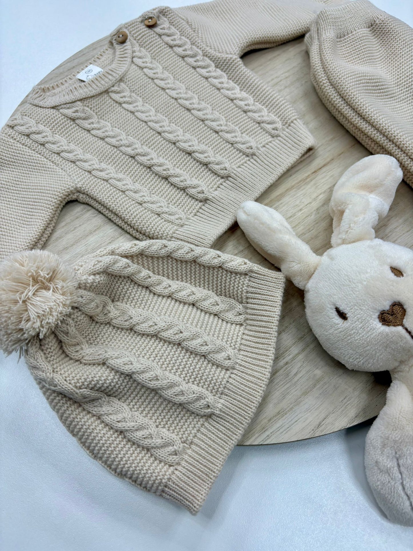 Conjunto primera puesta bebé jersey, gorro y polaina crudo