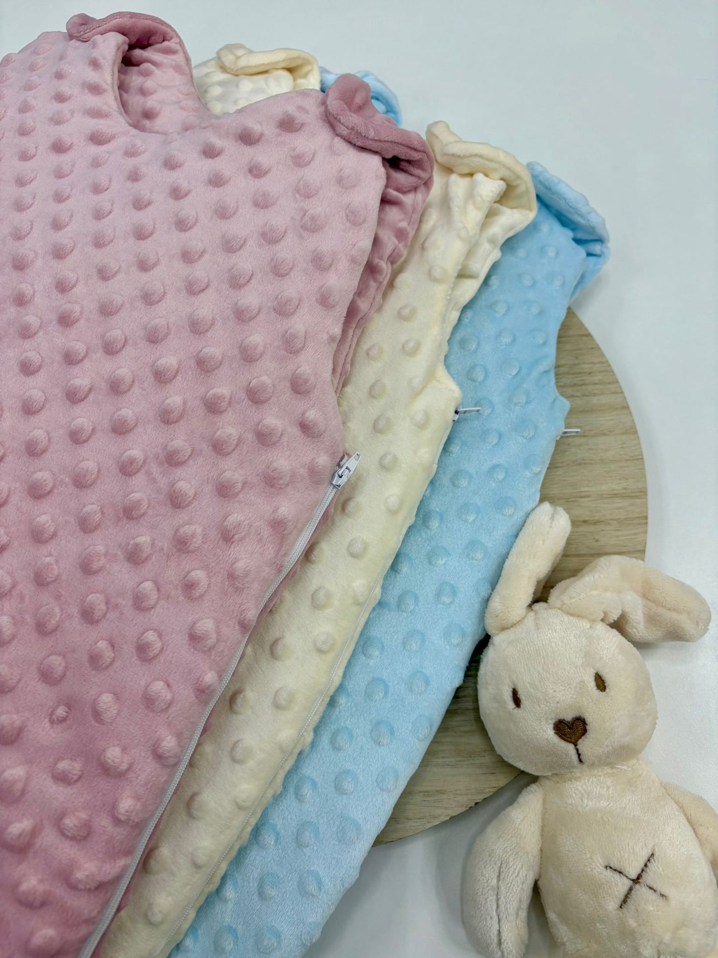 Saco para dormir bebé con cremallera lateral | Colores rosa empolvado, crudo y celeste