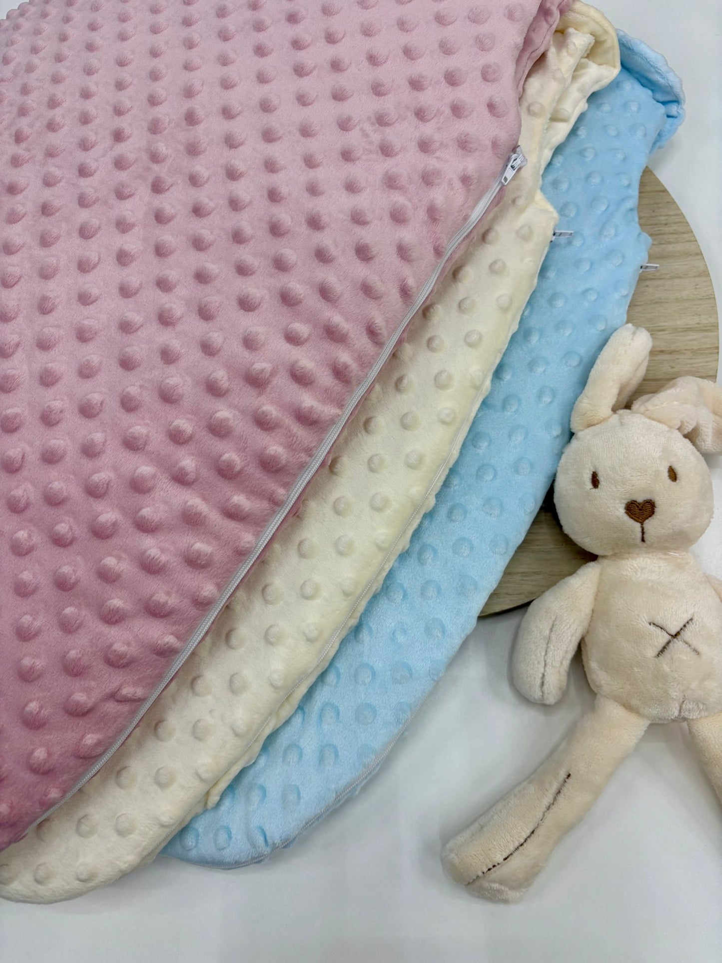 Saco para dormir bebé con cremallera lateral | Colores rosa empolvado, crudo y celeste