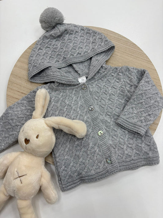 Chaqueta punto bebé con capucha y pompón color gris