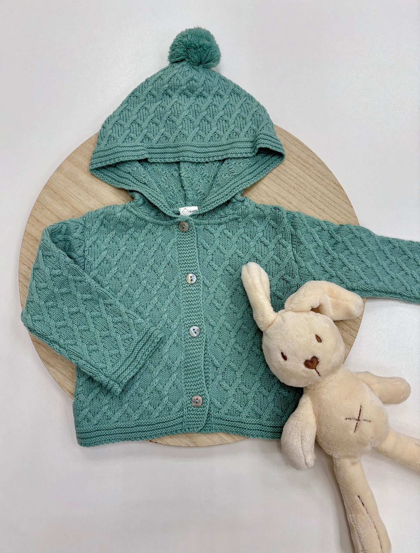 Chaqueta punto bebé con capucha y pompón color mint