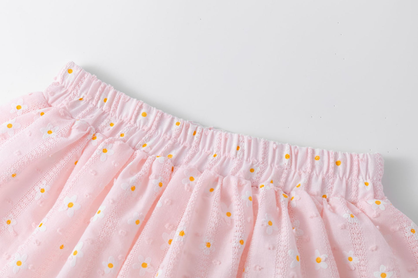 Falda de tejido estampado margaritas con cintura elástica