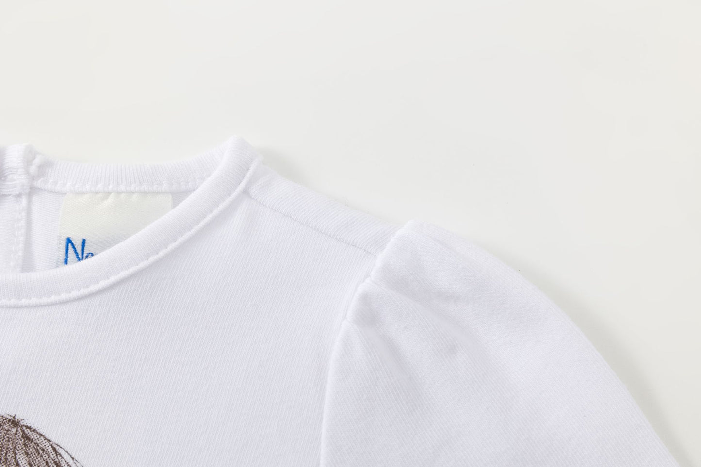 Camiseta bebé niña blanca manga larga con frunce y glitter ✨🌸 - BGI65514