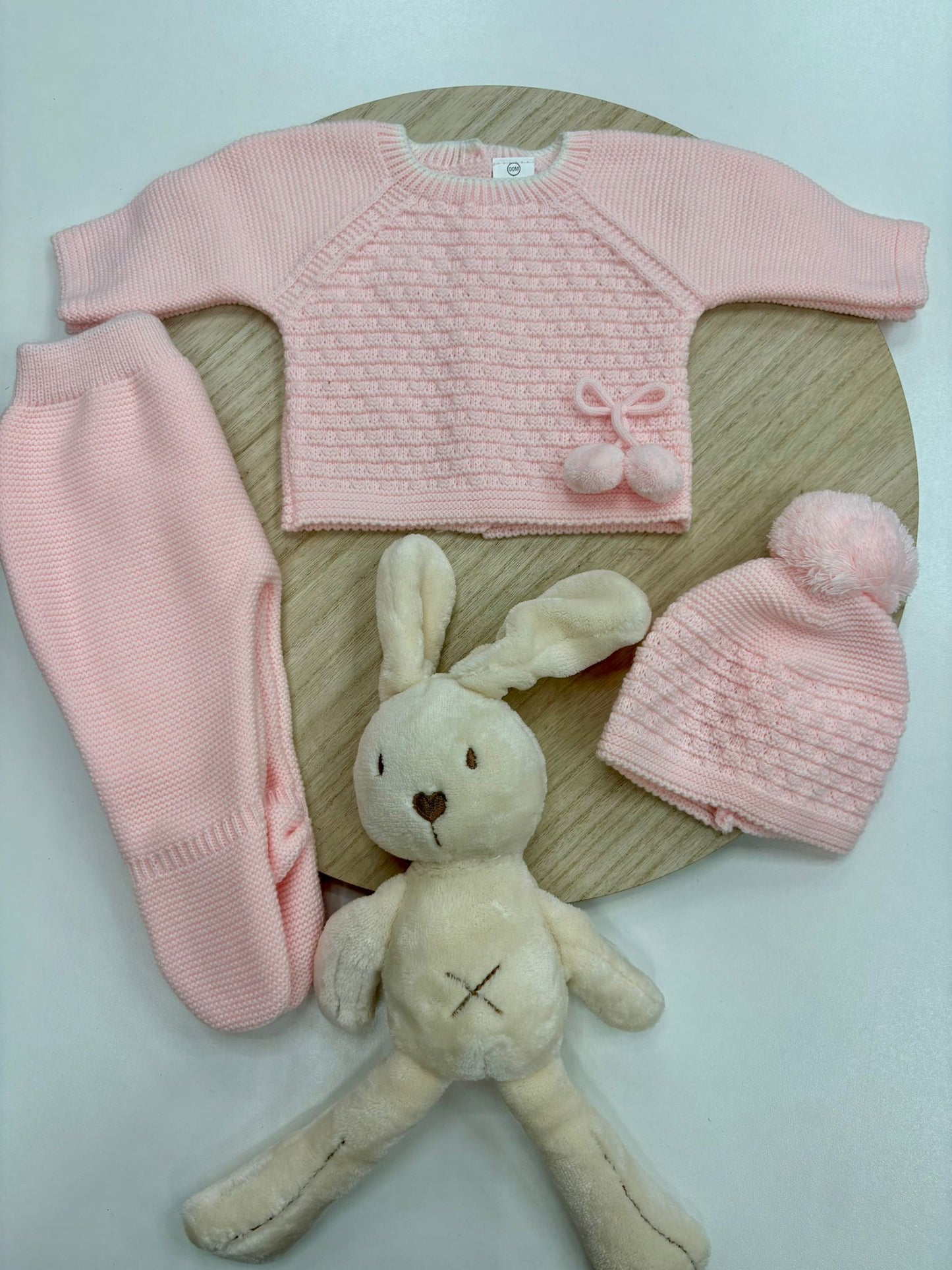 Conjunto primera puesta bebé 2 piezas rosa bebé modelo pompón con gorro – 00 prematuro a 6 meses
