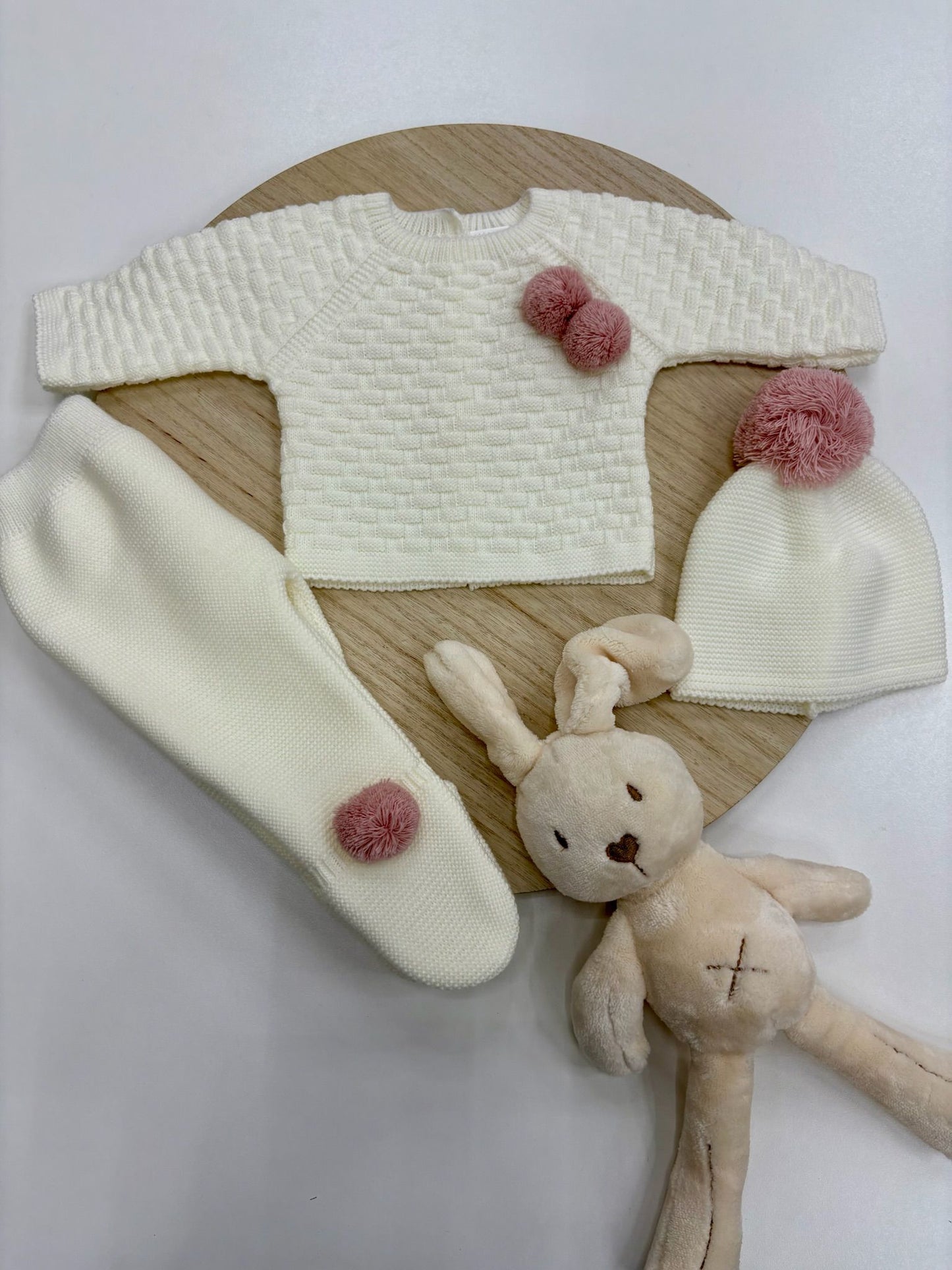 Conjunto bebé Pom Pom marfil con pompones rosa empolvado