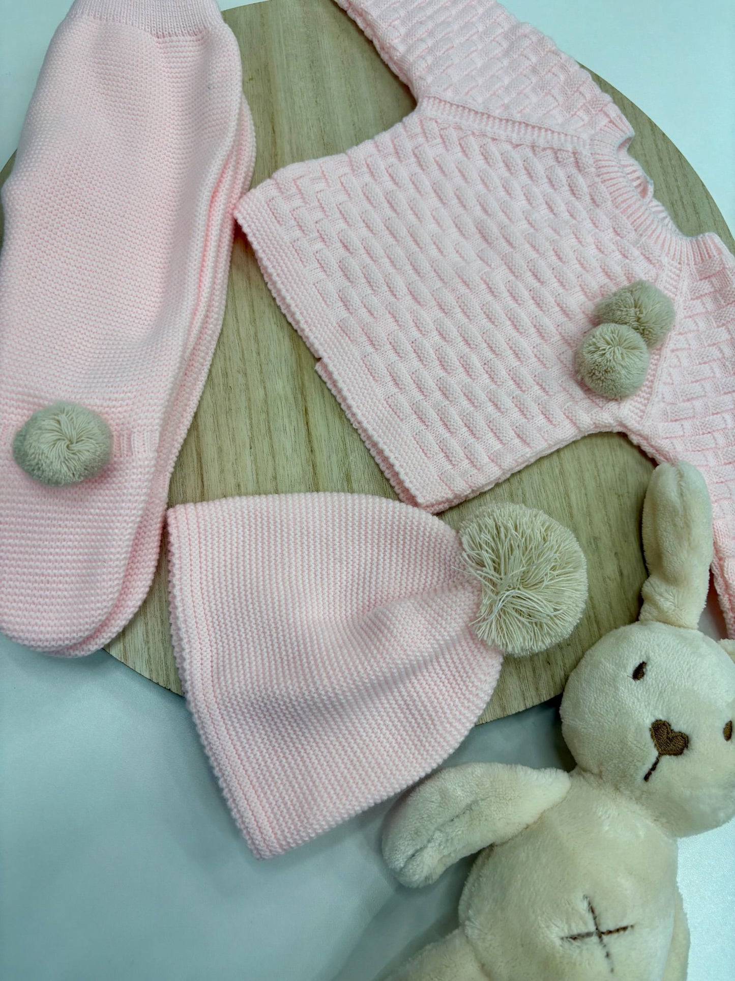 Conjunto bebé Pom Pom rosa bebé con pompones color arena