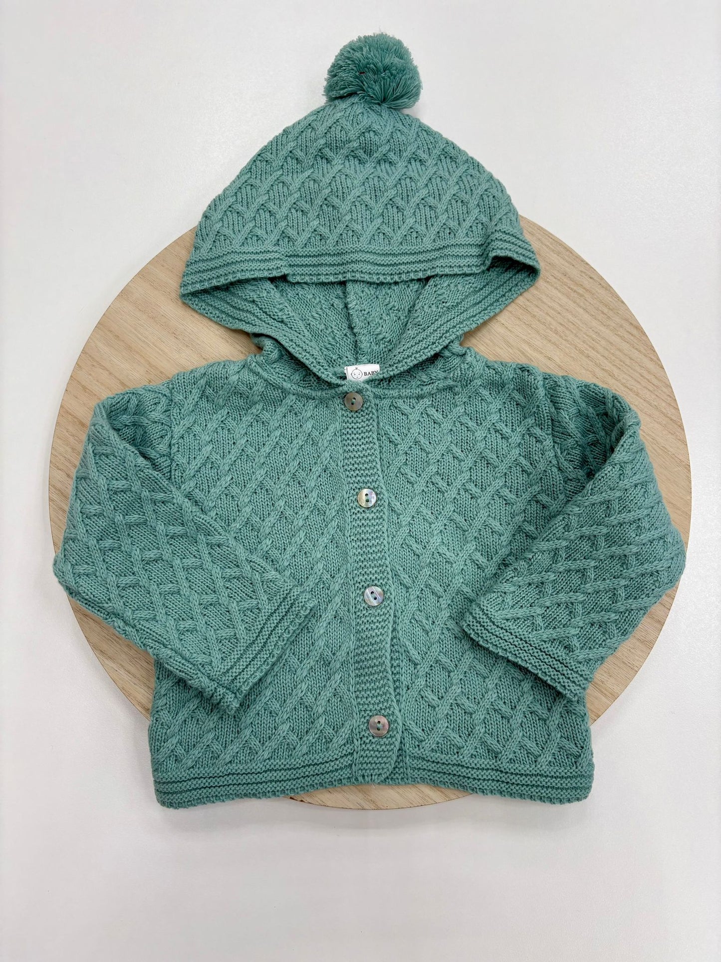 Chaqueta punto bebé con capucha y pompón color mint